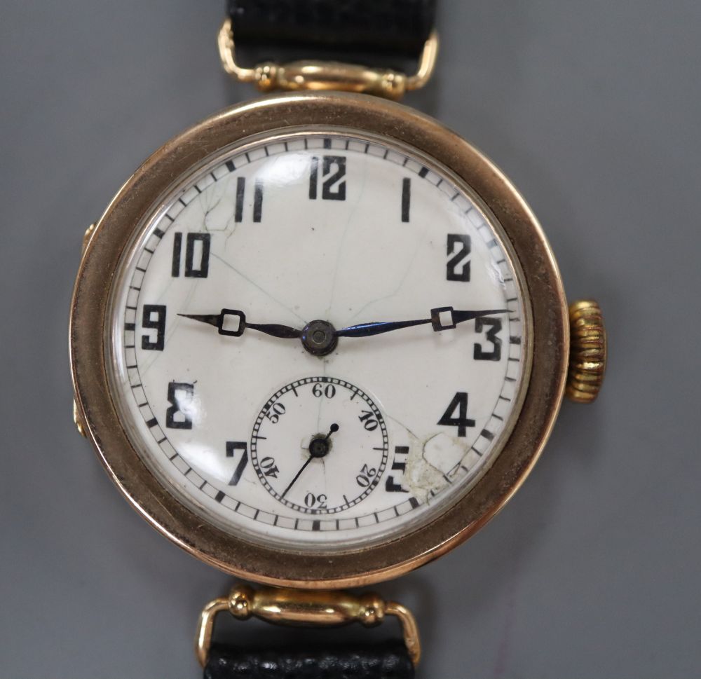 An early 20th century 9ct gold Rolex manual wind wrist watch, with Arabic dial and subsidiary seconds, (dial a.f.)